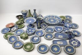 A large collection of assorted Wedgwood Jasperware ceramics. Mostly blue with some green.
