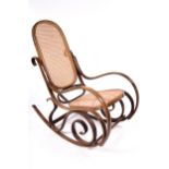 Vintage Retro : A stained beech wood rocking chair.