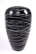 Vintage / Retro : A dark purple (Black) tall glass vase with white trailed glass decoration.
