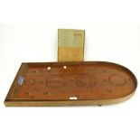 A wooden vintage Holey Bogey Corinthian Bagatelle board and rules. By Abbey. 76cm x 38.