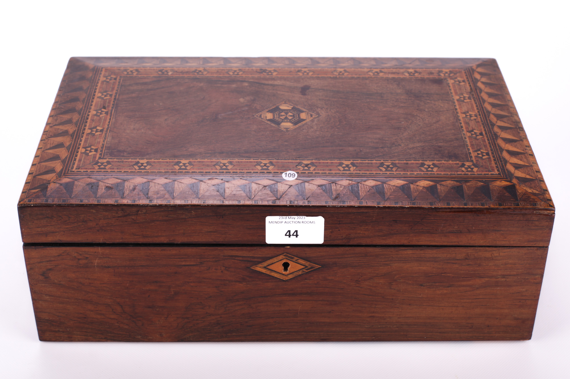 A Victorian rosewood and marquetry writing slope. With a pink velvet inset slope.