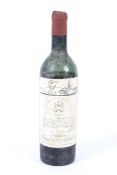 A bottle of vintage Chateau Mouton Rothschild 1955, numbered 107,982 (low neck).