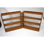 A pair of vintage oak open bookcases. With Utility logo stamped in the back #F271/4. W92cm x D19.