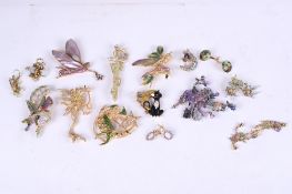 A collection of assorted Kirks Folly brooches and earrings.