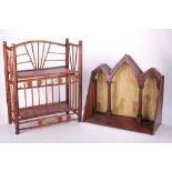 A Gothic design mahogany wall bracket and a set of bamboo hanging shelves.