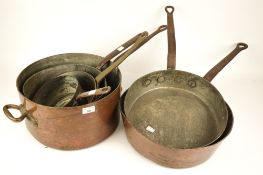 Six assorted iron handled copper saucepans. Max. H17.