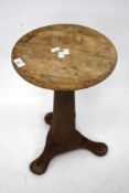 A vintage Singer industrial cast iron based adjustable work stool.