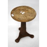A vintage Singer industrial cast iron based adjustable work stool.