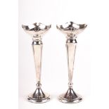 A pair of vintage silver weighted bud vases.