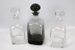 Three hand blown glass decanters. Including Dartington, max.
