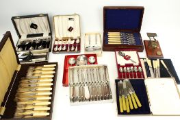 A collection of assorted vintage cased silverplated flatware.