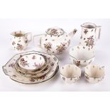 A Royal Doulton tea service for two.