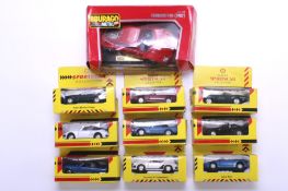 A collection of ten assorted diecast model cars, boxed.