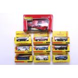 A collection of ten assorted diecast model cars, boxed.