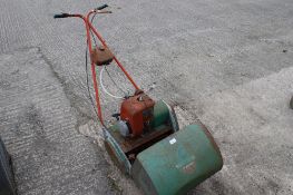 A vintage Suffolk Punch 14" Super petrol lawn mower. With grass box.