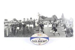 A signed rugby ball and two black and white photographs of rugby.