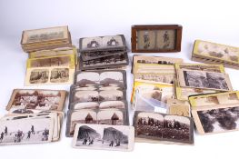 A Victorian burr walnut stereoscopic viewer and cards.