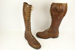 A pair of gentleman's 19th century knee length leather boots.