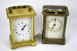 Two vintage brass carriage cased carriage clocks.