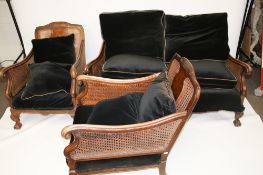 A 20th century bergere suite.