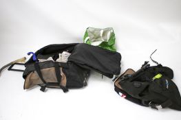 An assortment of snorkling kit. Including fins, weights, lights, a specialist bag etc.
