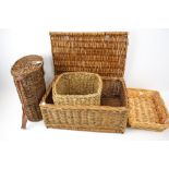 A group of four wicker baskets.