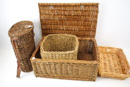 A group of four wicker baskets.