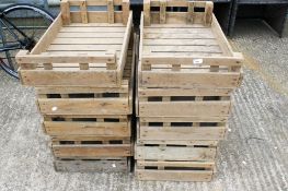 Ten vintage wooden crates.