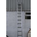 An Abru Starmaster DIY 3.5m two-section aluminium ladder.