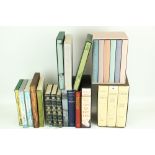 A collection of Folio Society books.