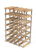 A wooden and metal wine rack. Capacity for 24 bottles, 40cm x 60cm x 23cm.