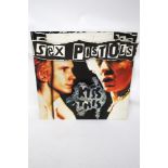 Sex Pistols : A 1992 point of sale advertising board for 'Sex Pistols Kiss This'.