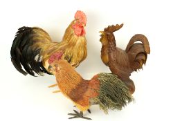 Three contemporary life size models of cockerels. Constructed of wood, straw and feathers, Max.