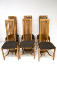 A set of six high back chairs.