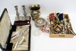 An assortment of silver plate and metalware.