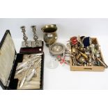 An assortment of silver plate and metalware.