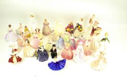 A large collection of porcelain 'Lady' figures.
