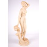 Vintage / Retro : A Kitsch cast cream coloured resin figure of a lady standing next to a wave. H47.