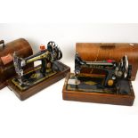 Two vintage sewing machines.