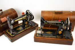 Two vintage sewing machines.