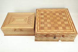 Two similar marquetry handmade games storage boxes.