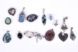 A collection of fifteen assorted silver and white metal pendants. Including amethyst, etc.