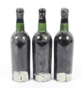 Three bottles of Fonseca vintage port thought to be 1960s. Labels missing, no qty or vol shown.