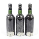 Three bottles of Fonseca vintage port thought to be 1960s. Labels missing, no qty or vol shown.