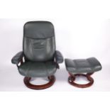 A green leather Stressless recliner arm chair and matching footstool. On a circular wooden base.