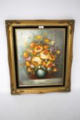A contemporary oil on canvas. Depicting a still life of flowers in a vase, signed 'Barratt', 49.