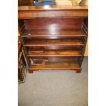 A mahogany open bookcase fitted with three adjustable shelves. L103cm x D28cm x H117cm.