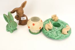 A collection of three assorted Sylvac pottery rabbits.