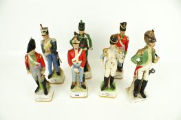 Six Alfretto porcelain figures of soldiers and one other.