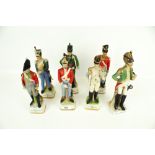 Six Alfretto porcelain figures of soldiers and one other.